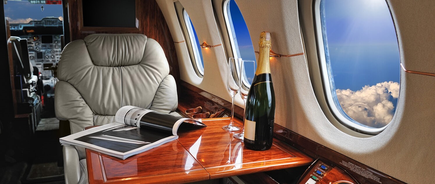 Fly business class for less with CardUp